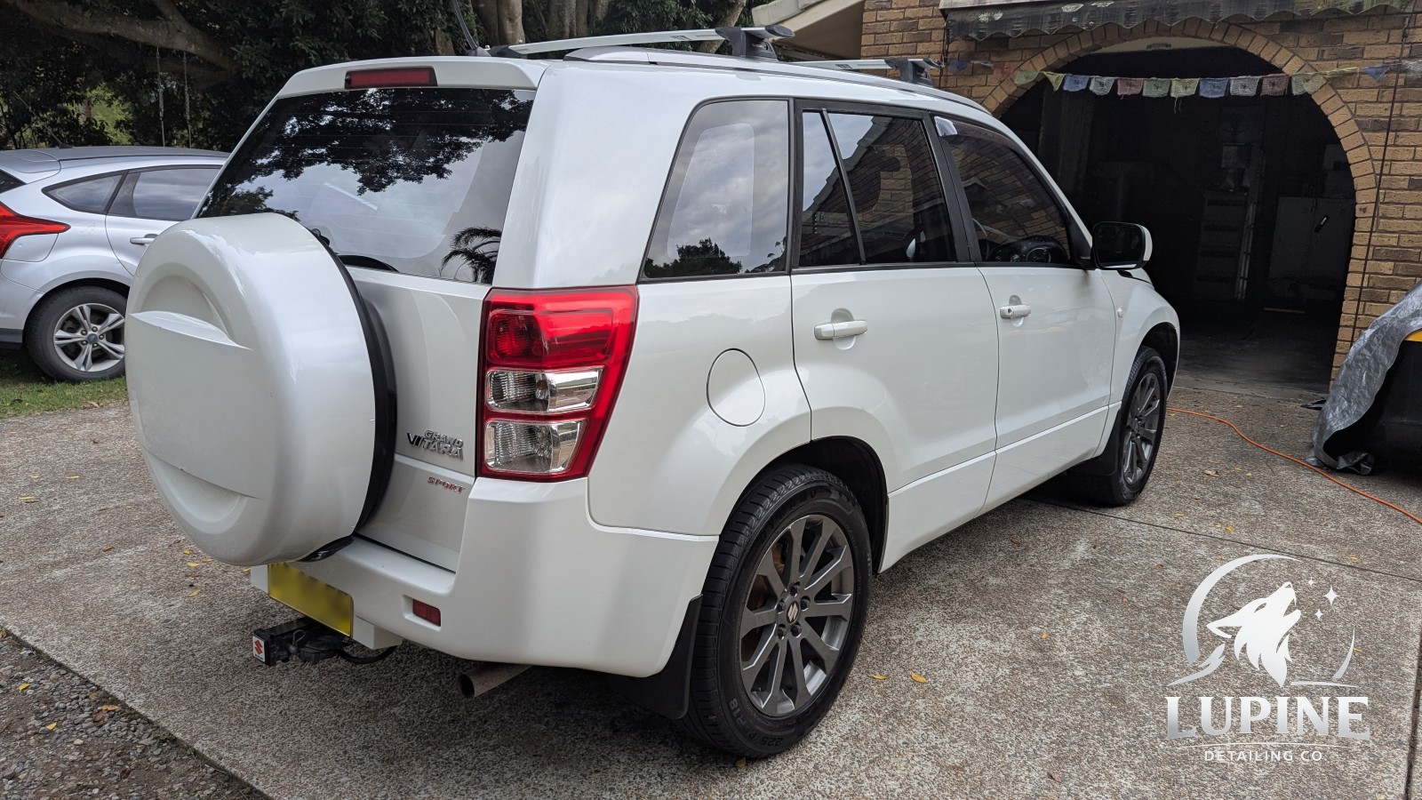 Suzuki Grand Vitara rear right after detail